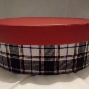 Black and red plaid oval storage container